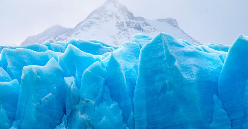Glaciers - Blue Icebergs Under Cloudy Sky