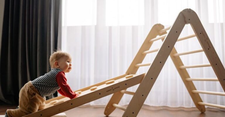 Child Development - Boy Climbing on Wooden Ladder