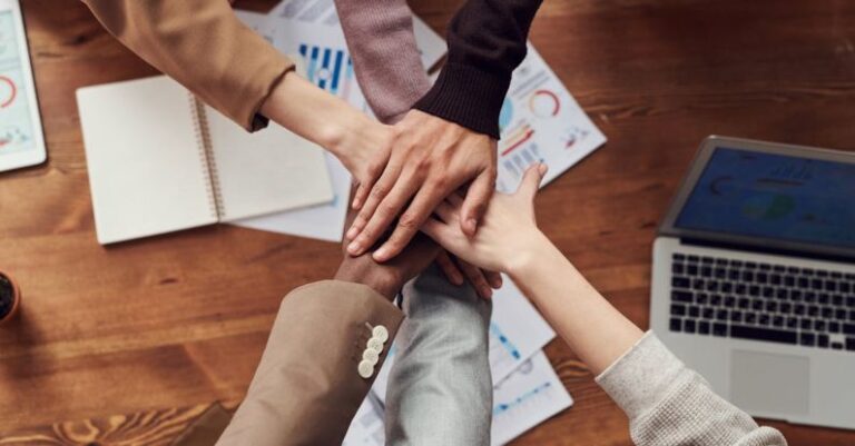 Teamwork - Photo Of People Near Wooden Table